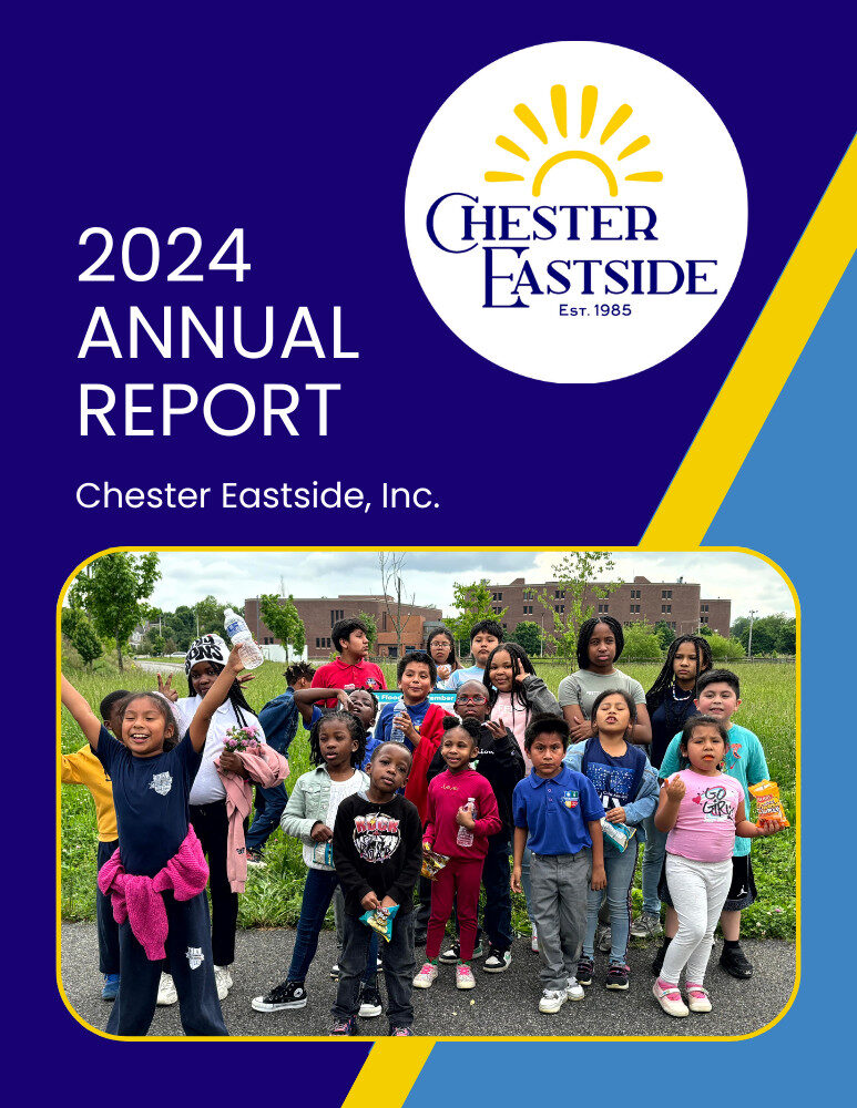 2024 Annual Report front page, with the Chester Eastside logo on the right upper side. Below it is a large group of children outside in front of a lawn.